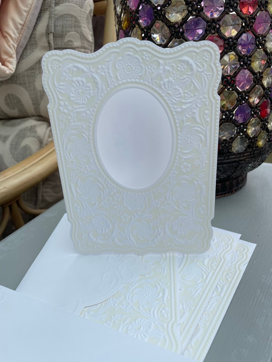 4 Fancy label shaped embossed card blank with oval apature