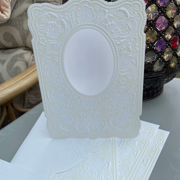 4 Fancy label shaped embossed card blank with oval apature