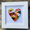 Fused glass cast heart in box frame . 