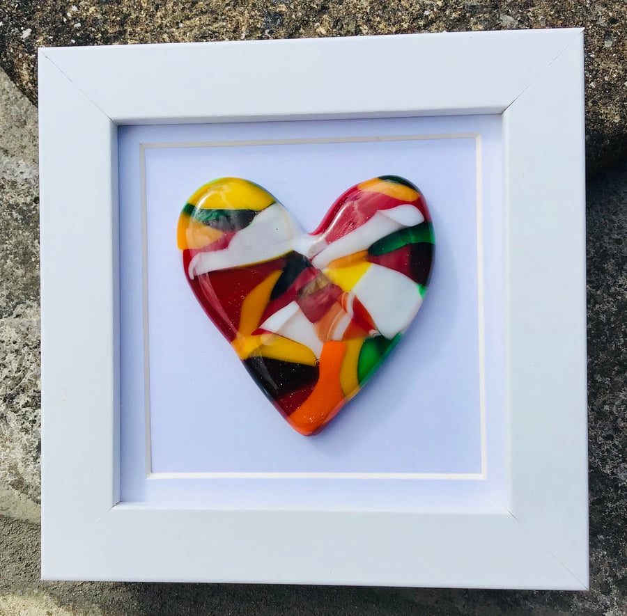 Fused glass cast heart in box frame . 