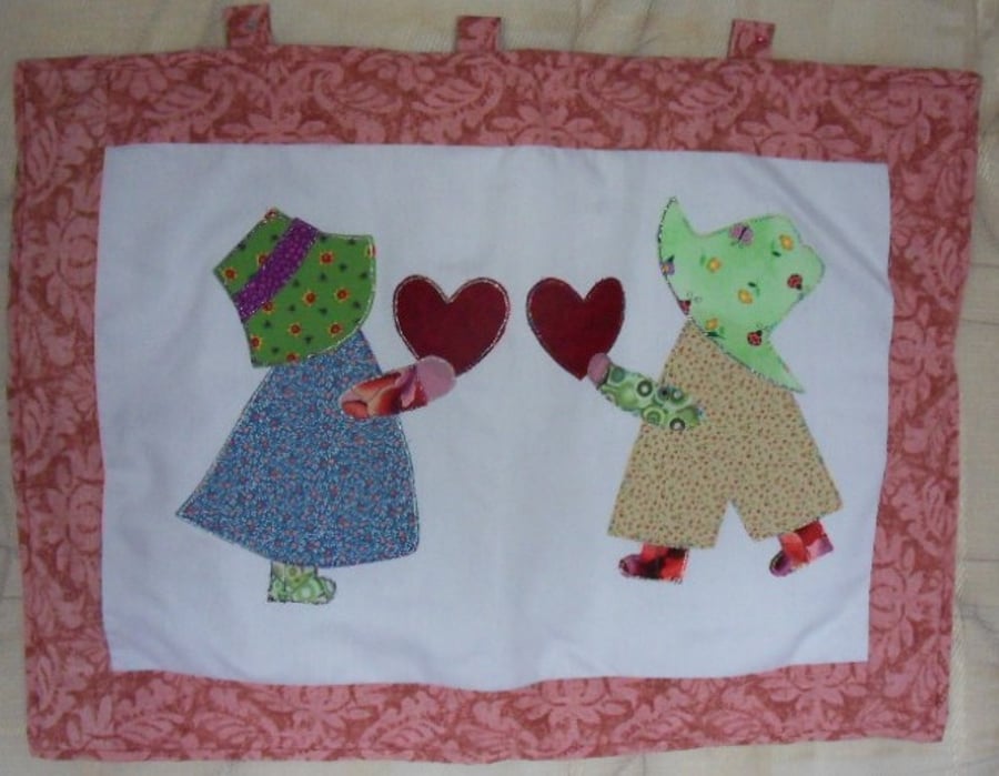 Handmade sunbonnet Sue and Sam wall hanging. approx measurement 22" x 16"