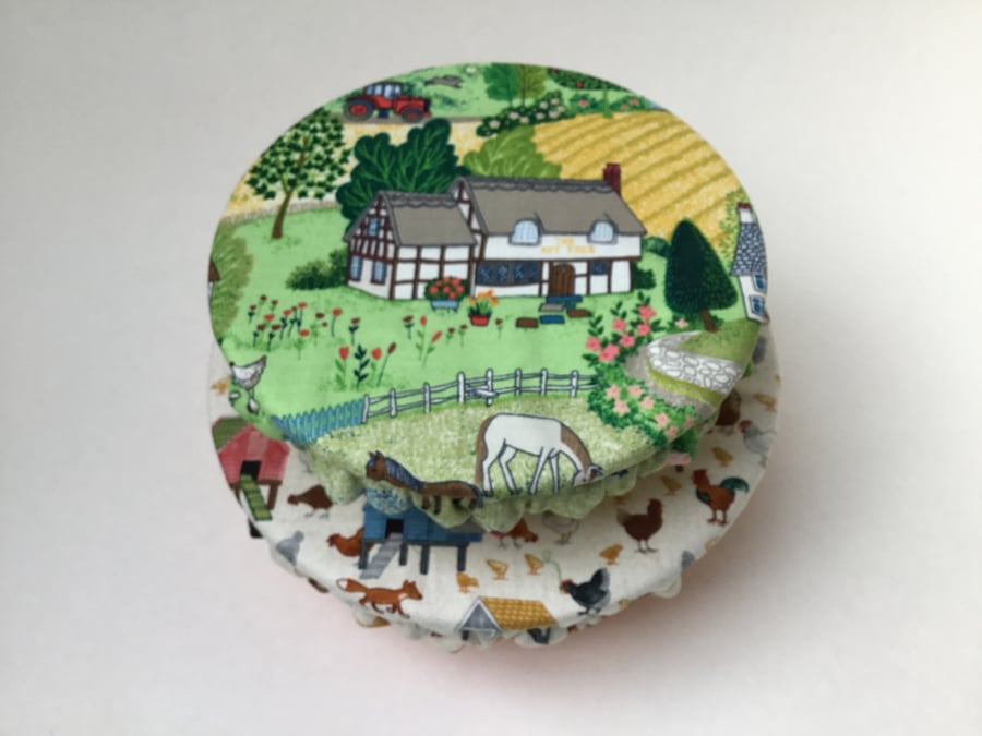 Two bowl covers to keep food fresh and safe. Farmyard prints