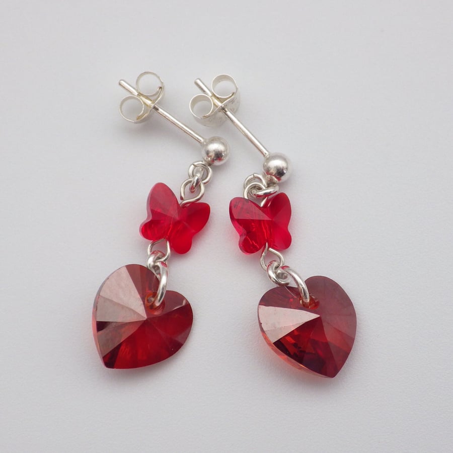 Red magma Swarovski heart earrings with butterfly beads