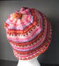 Handknit KNOTTY TOP BEANIE Stripey jacquard in Pinks & Reds child teen adult sma - Image 1