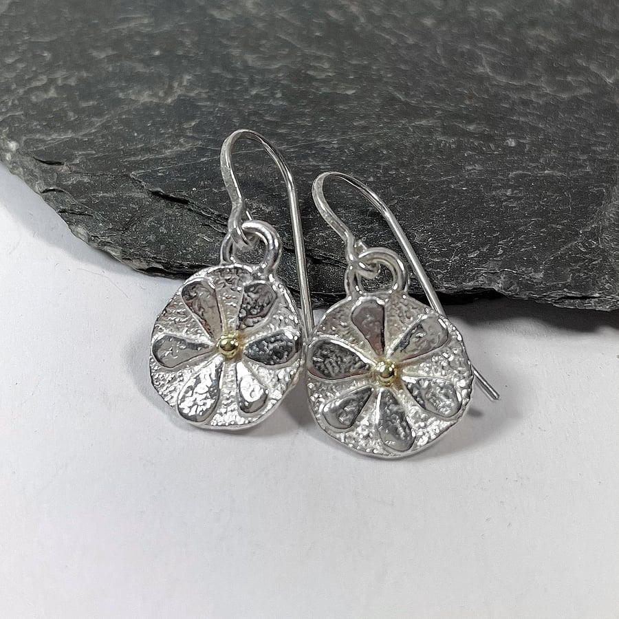 Small sterling silver flower earrings with gold centres