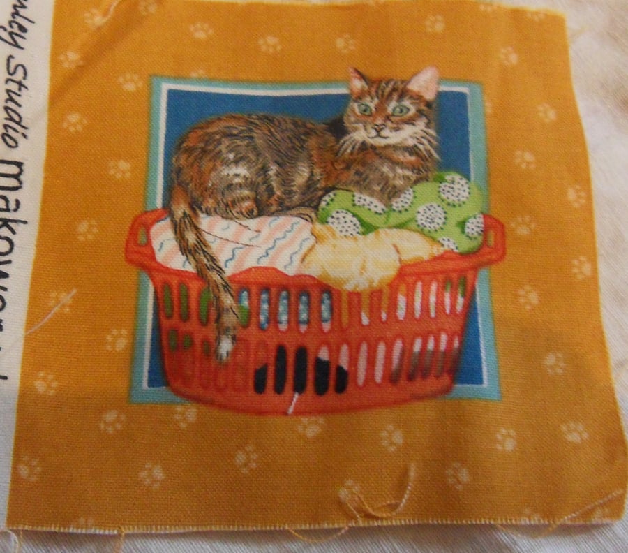 100% cotton fabric squares. Cat in a wash basket (71)