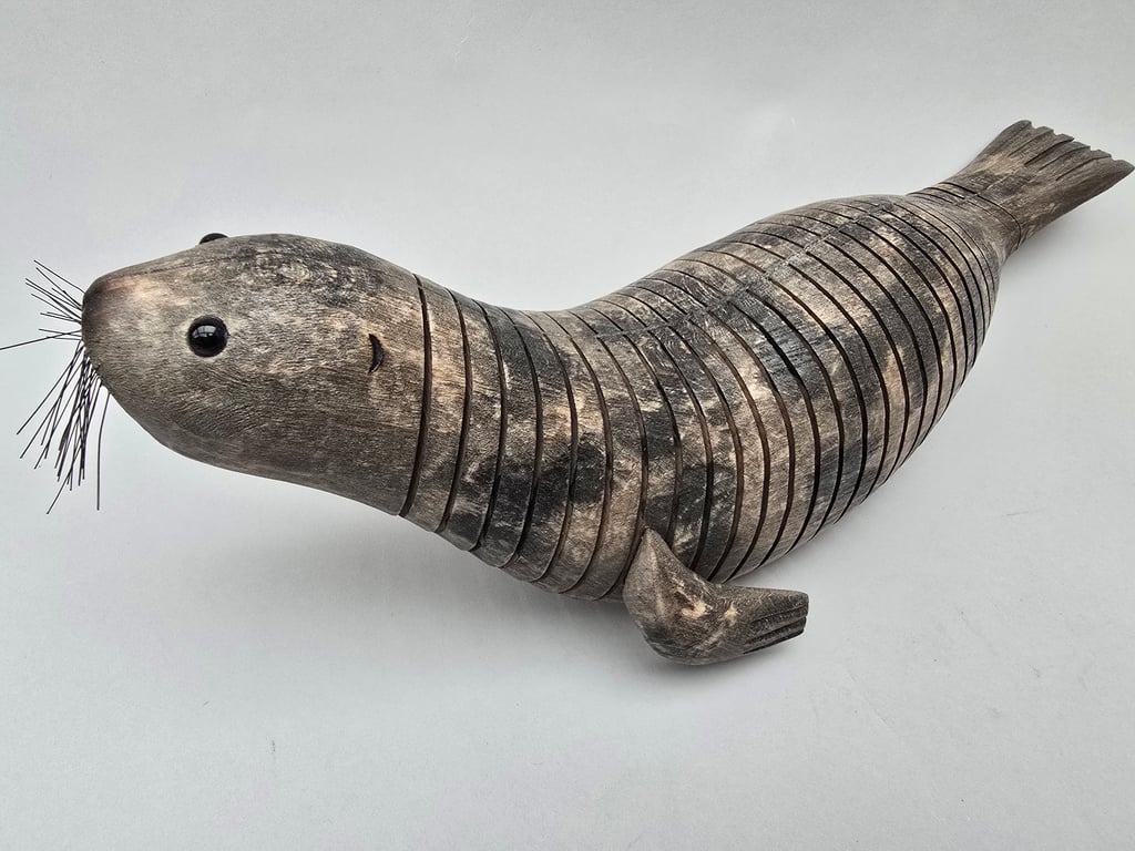 Articulating seal in beech