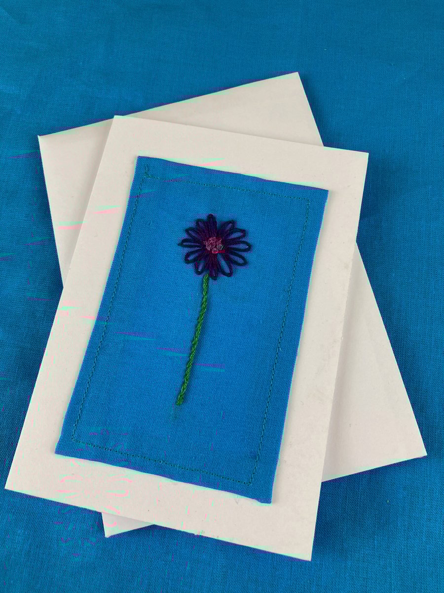 Purple daisy hand embroidered card.