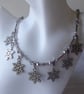 Necklace with Seven Enamelled Snowflakes & Faceted Glass and Metal beads