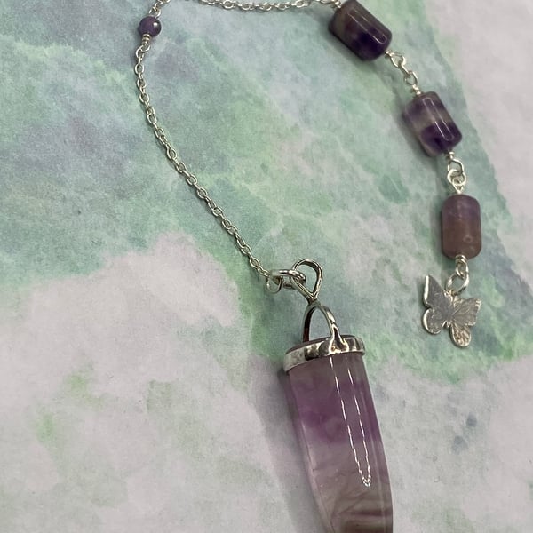 Green and purple fluorite pendulum on sterling silver chain
