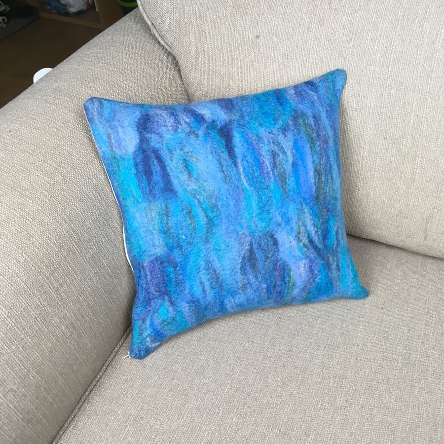 Cushion, hand felted in blue shades (15")