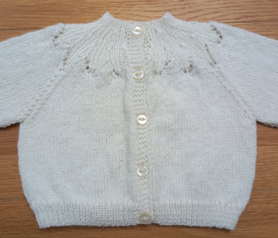 Handknitted cream baby cardigan, approx 0-3 months, to fit a 16" chest