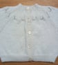 Handknitted cream baby cardigan, approx 0-3 months, to fit a 16" chest