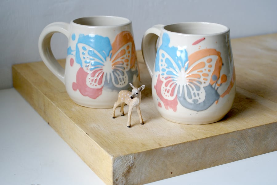 Set of two colourful summer butterfly mugs