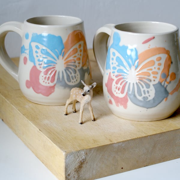 Set of two colourful summer butterfly mugs