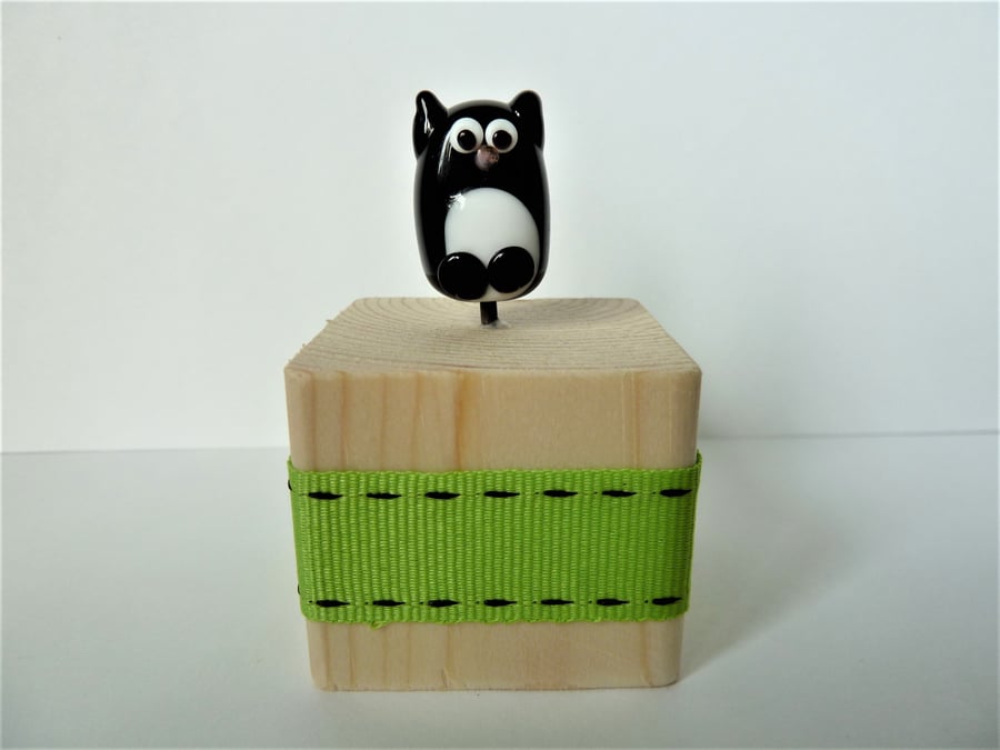glass cat on wooden block gift