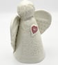 Porcelain Angel sculpture with red heart - Image 3