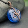 Copper Wire Wrapped Blue Glass Pendant