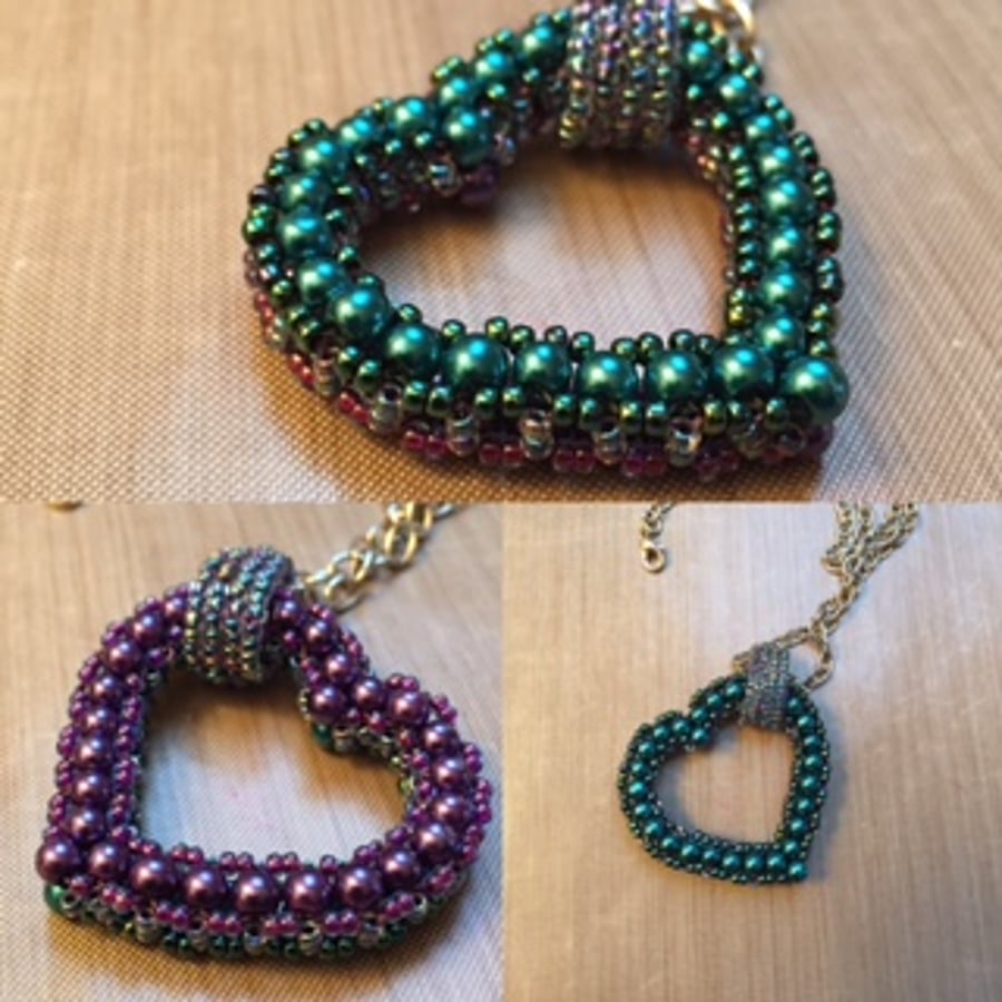 Purple and teal glass pearl beaded reversible heart pendant