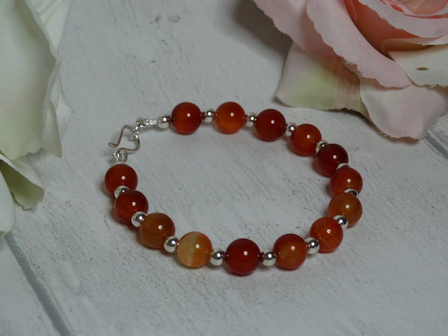 Carnelian gemstone and silver bead bracelet sacral chakra