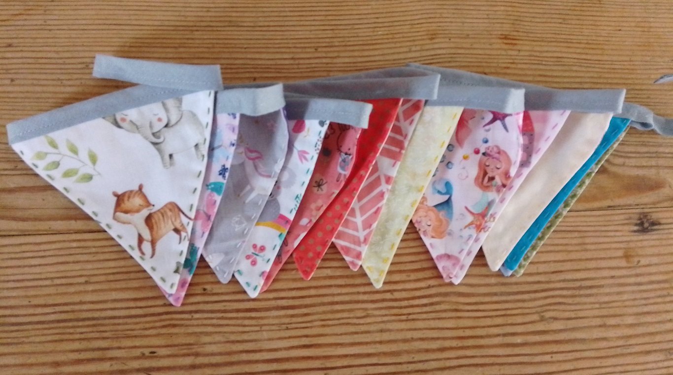 Handmade mini bunting in an animal and princess theme.