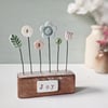 Clay and Button Flower Garden in a Wood Block 'Joy'
