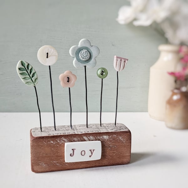 Clay and Button Flower Garden in a Wood Block 'Joy'
