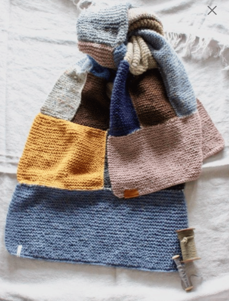 Hand-knitted patchwork scarf wrap