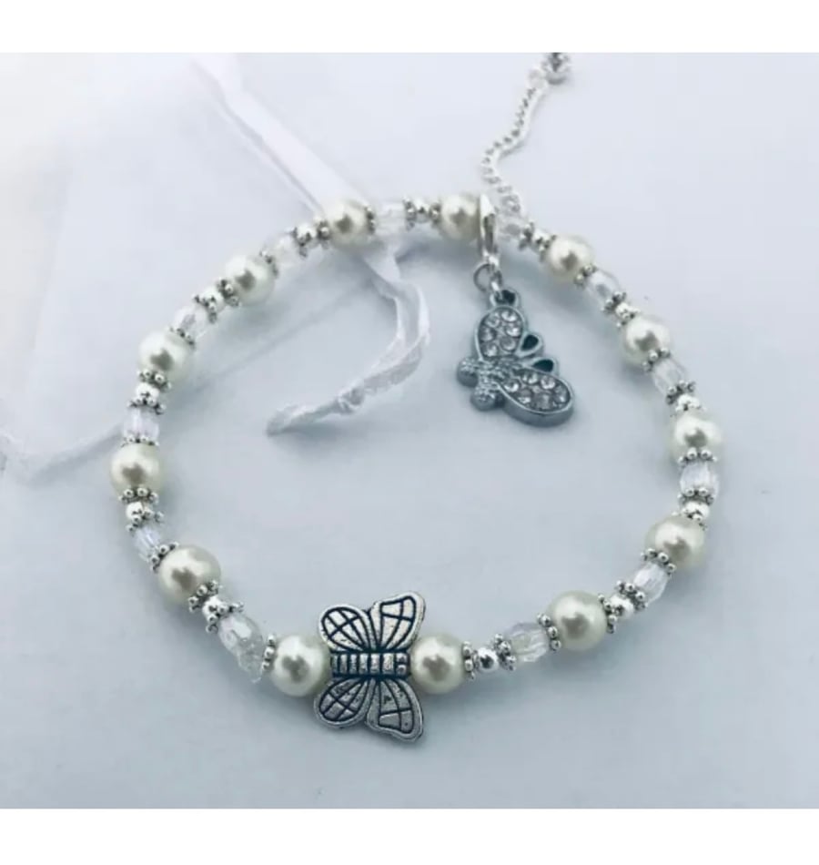 Rhinestone butterfly charm Ivory beaded bracelet