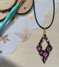 Pink circular patterned diamond hand painted wooden necklace 
