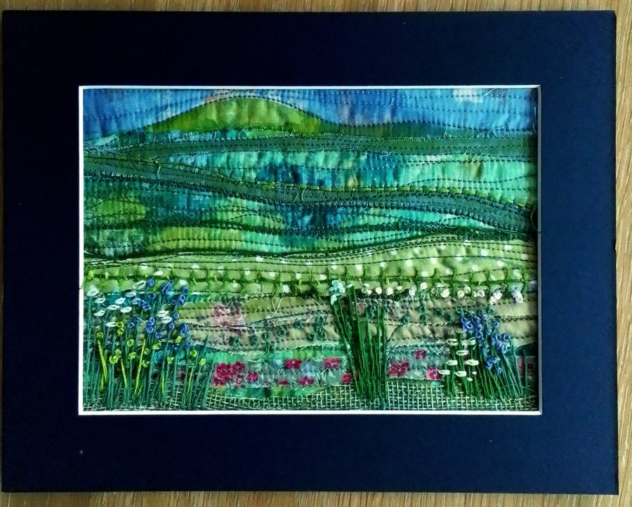 Textile picture with fabric and embroidery 