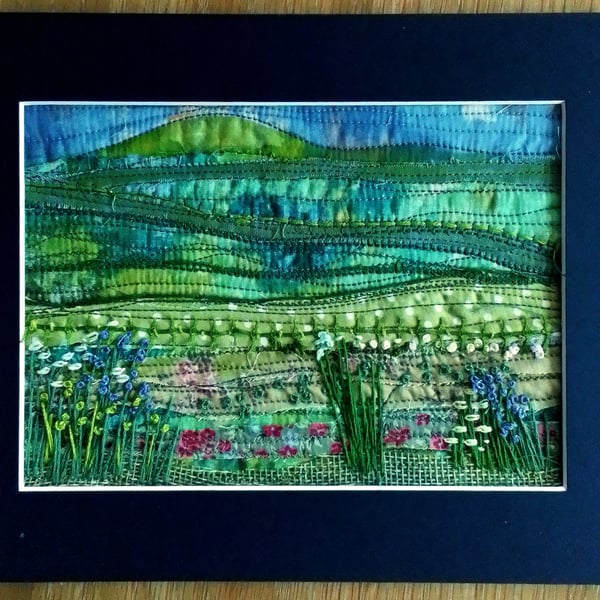 Textile picture with fabric and embroidery 