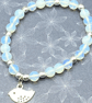 Stretchy bracelet with opalite stones and silver plated bird charm - Image 5