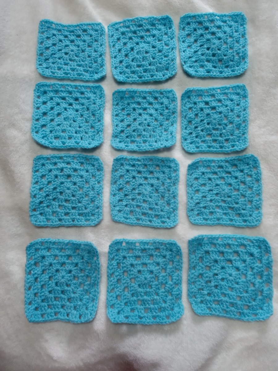 set of blue crochet granny squares