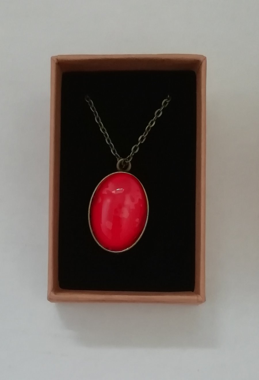 Marble clay glass costume jewellery pendant with a bronze metal chain  