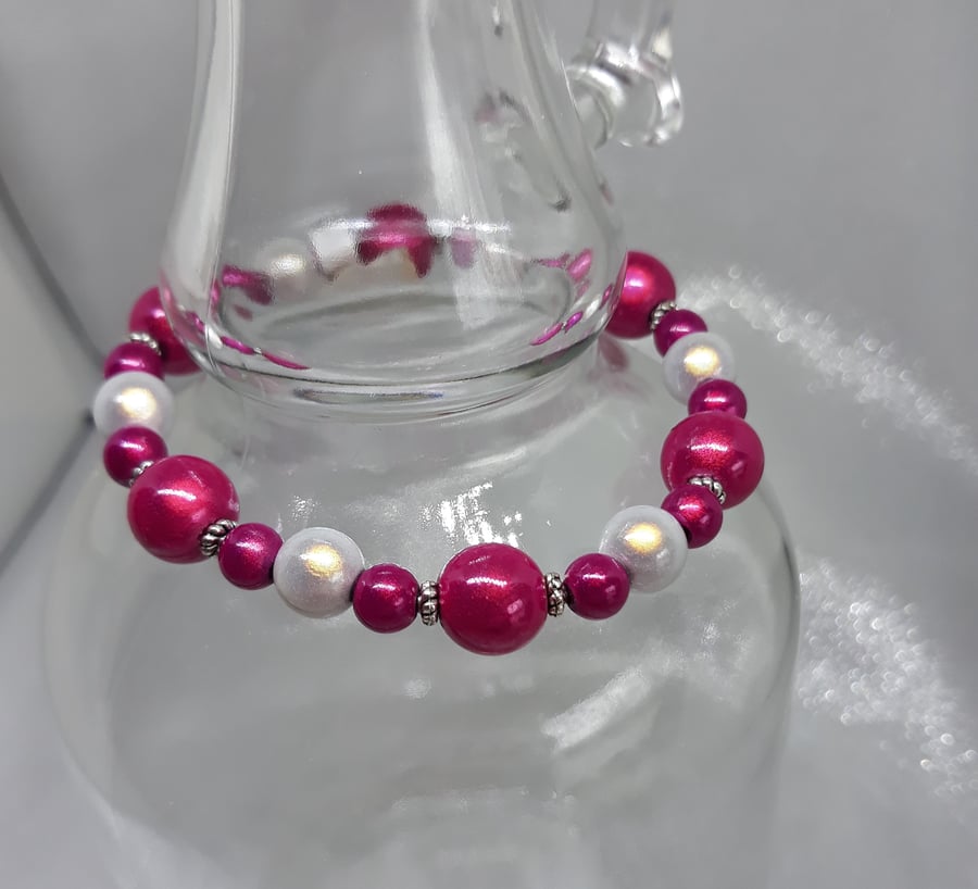 BR263 Shocking pink shimmering miracle bead bracelet