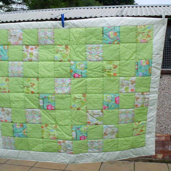 unisex green patchwork nursery quilt, cot blanket with owls or play mat
