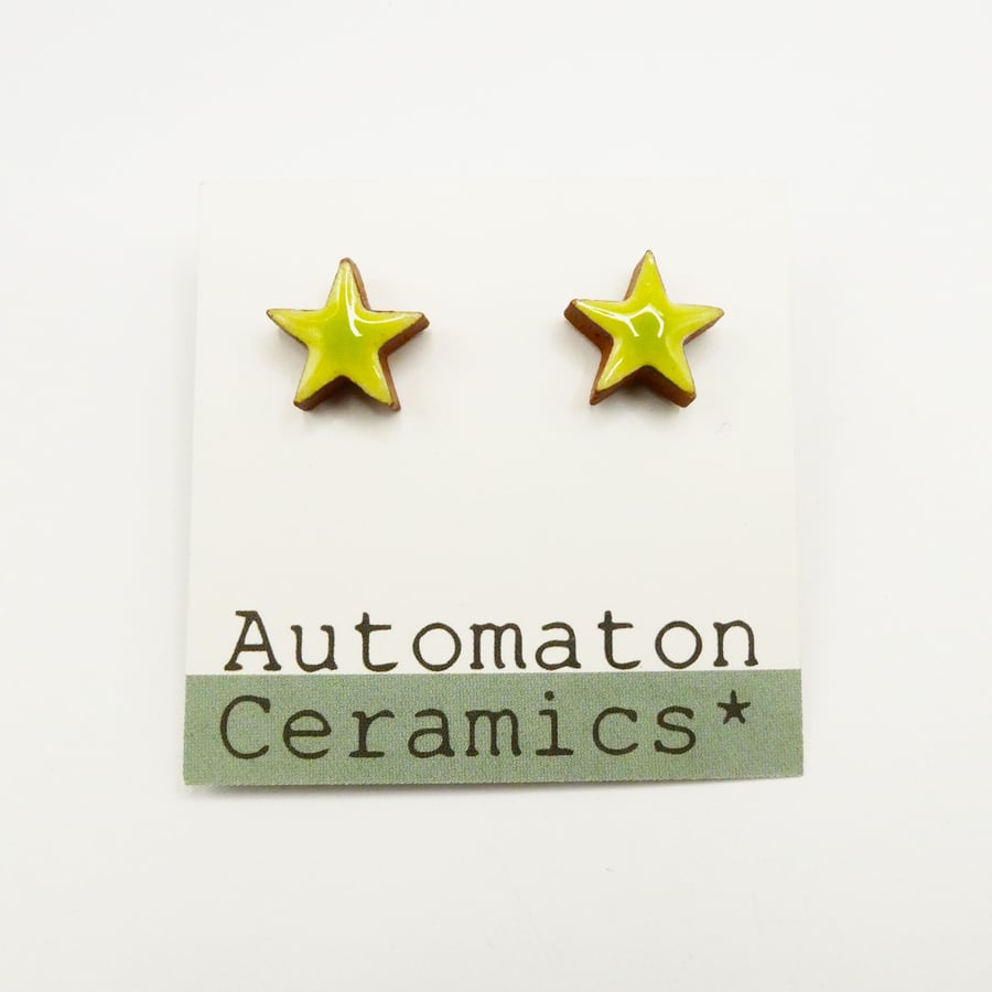 Green stud earrings, star shaped studs