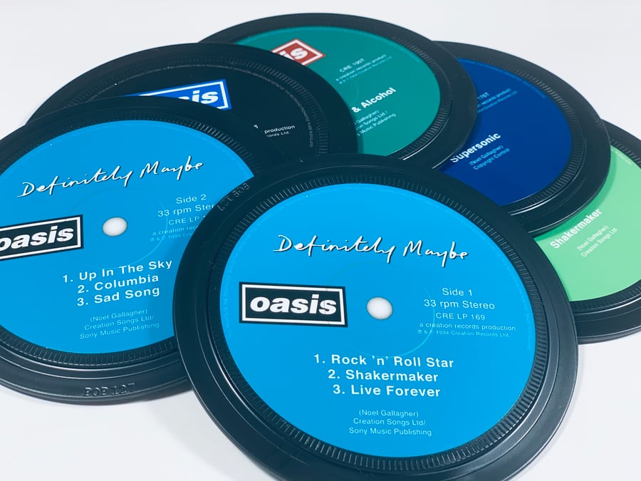 Oasis - 6 vinyl record coasters in a tin.