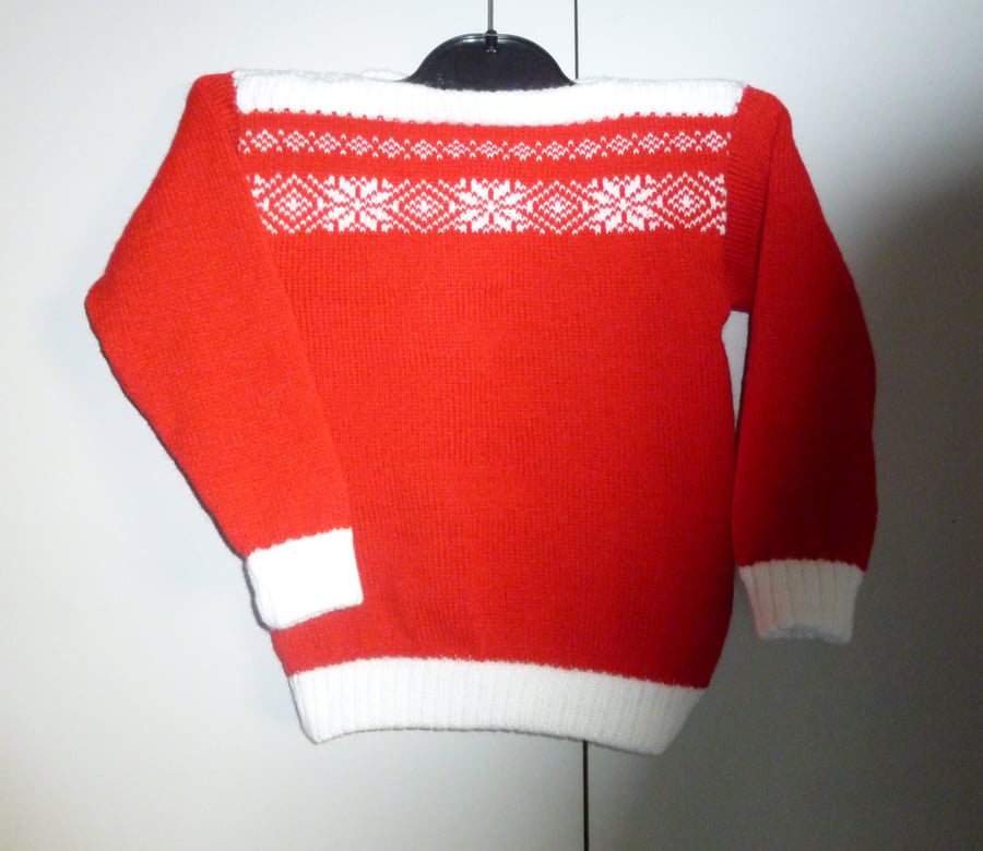 A knitted child's 24 inch winter jumper (fa 627 ))