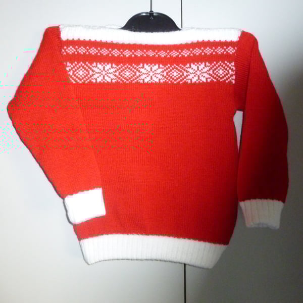 A knitted child's 24 inch winter jumper (fa 627 ))