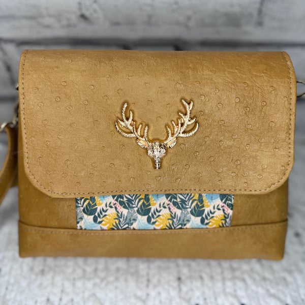 Small crossbody with Stag detail in Sand coloured ostrich faux leather 