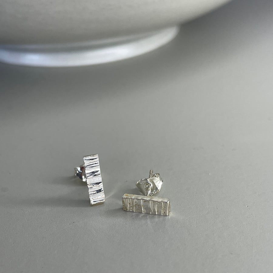 Sterling silver tiny bar hammered bark texture post earrings