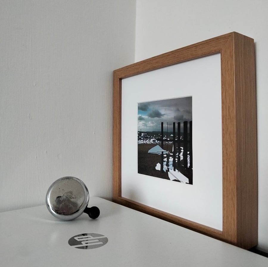 A framed and mounted print of my original artwork (Breakwater)