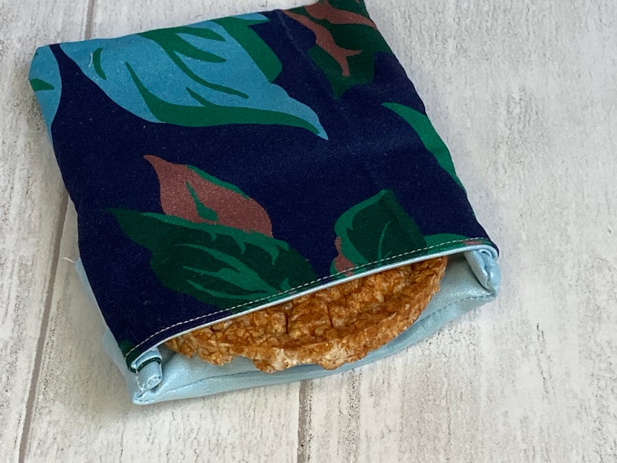 Reusable snack bag with food safe lining. Navy floral. Seconds