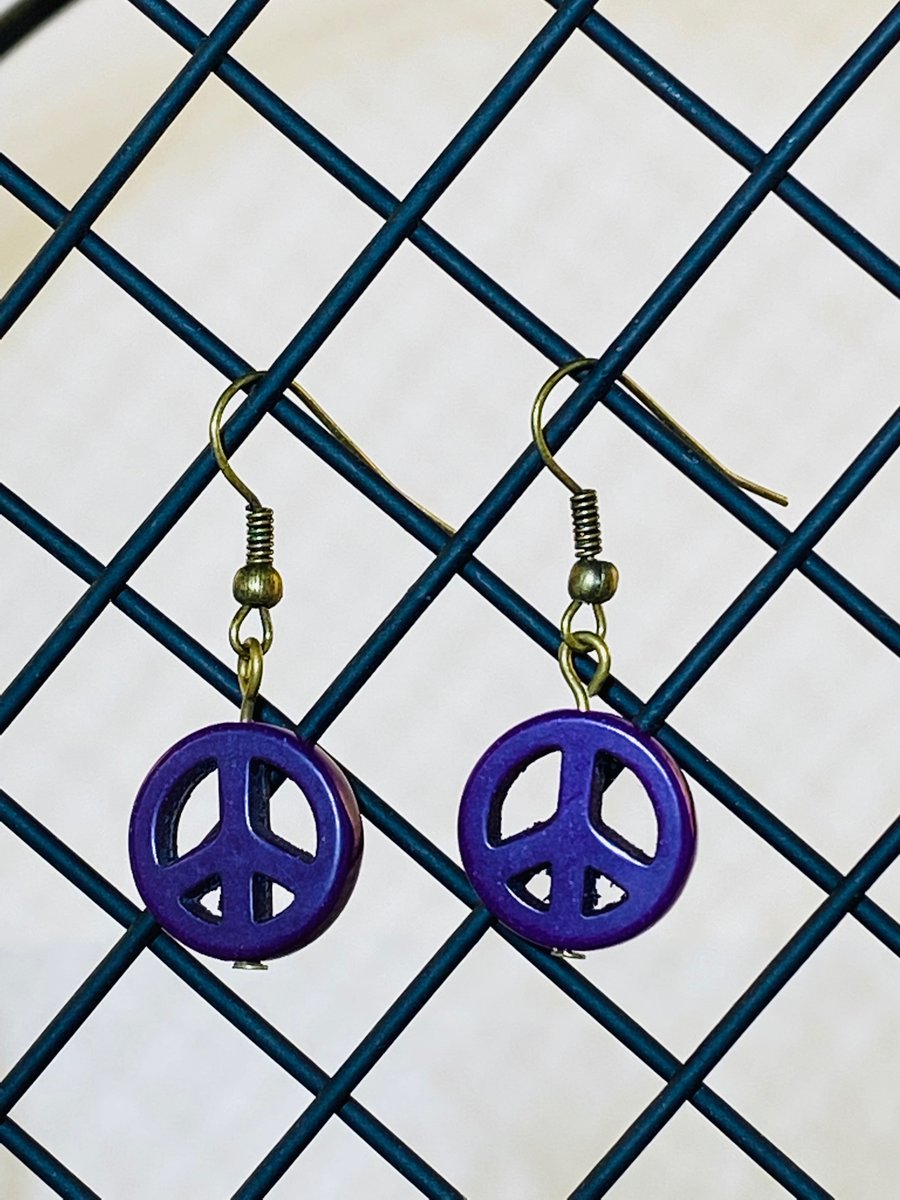 Purple CND earrings 