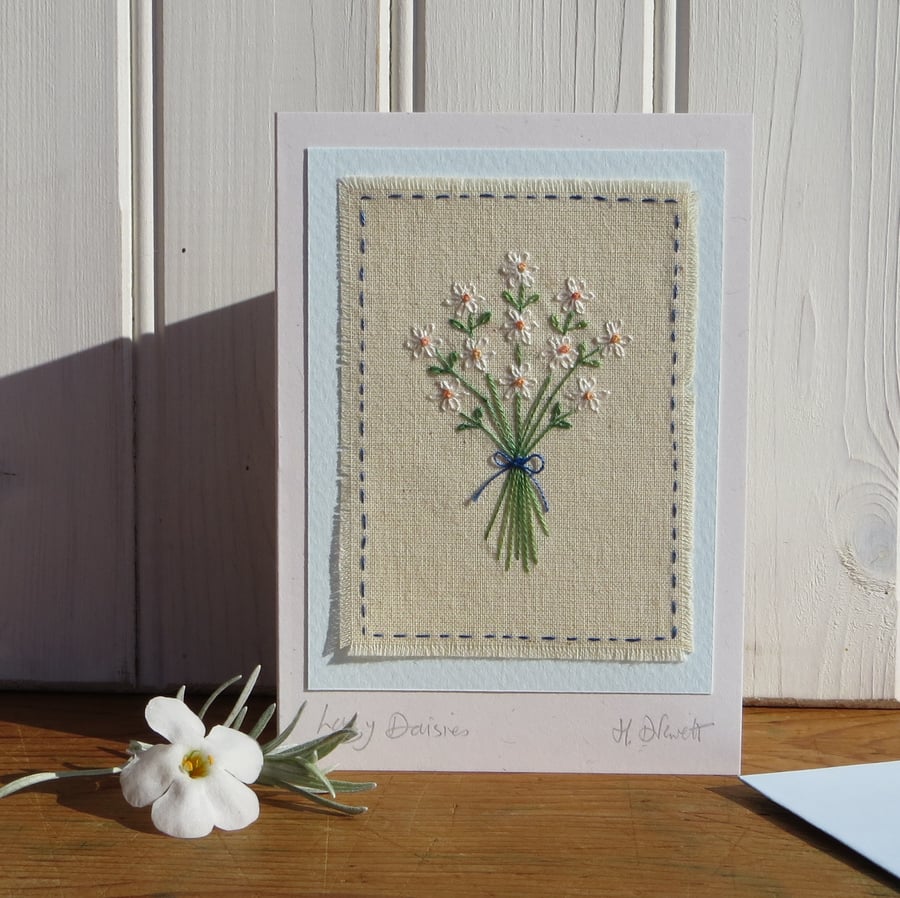 Lazy Daisies hand embroidered card with finely worked daisies and bow