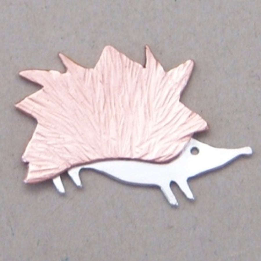Hedgehog brooch in copper and sterling silver
