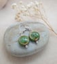 silver plated earrings withgreen glazed ceramic flat circle beads hypoallergenic
