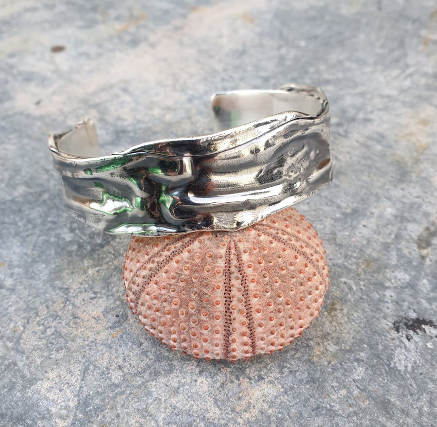 Folded silver textured open bangle